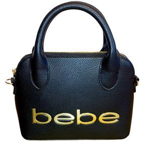 Smaller size bebe brand black and gold pebbles leather bag for makeup or carry